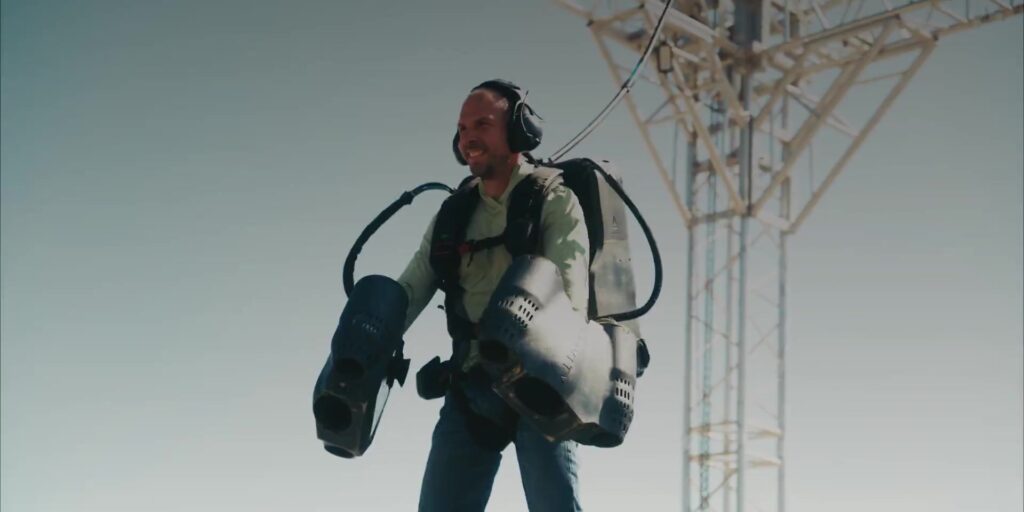 A pilot wearing Gravity Industries’ turbine-powered Jet Suit in a demonstration.