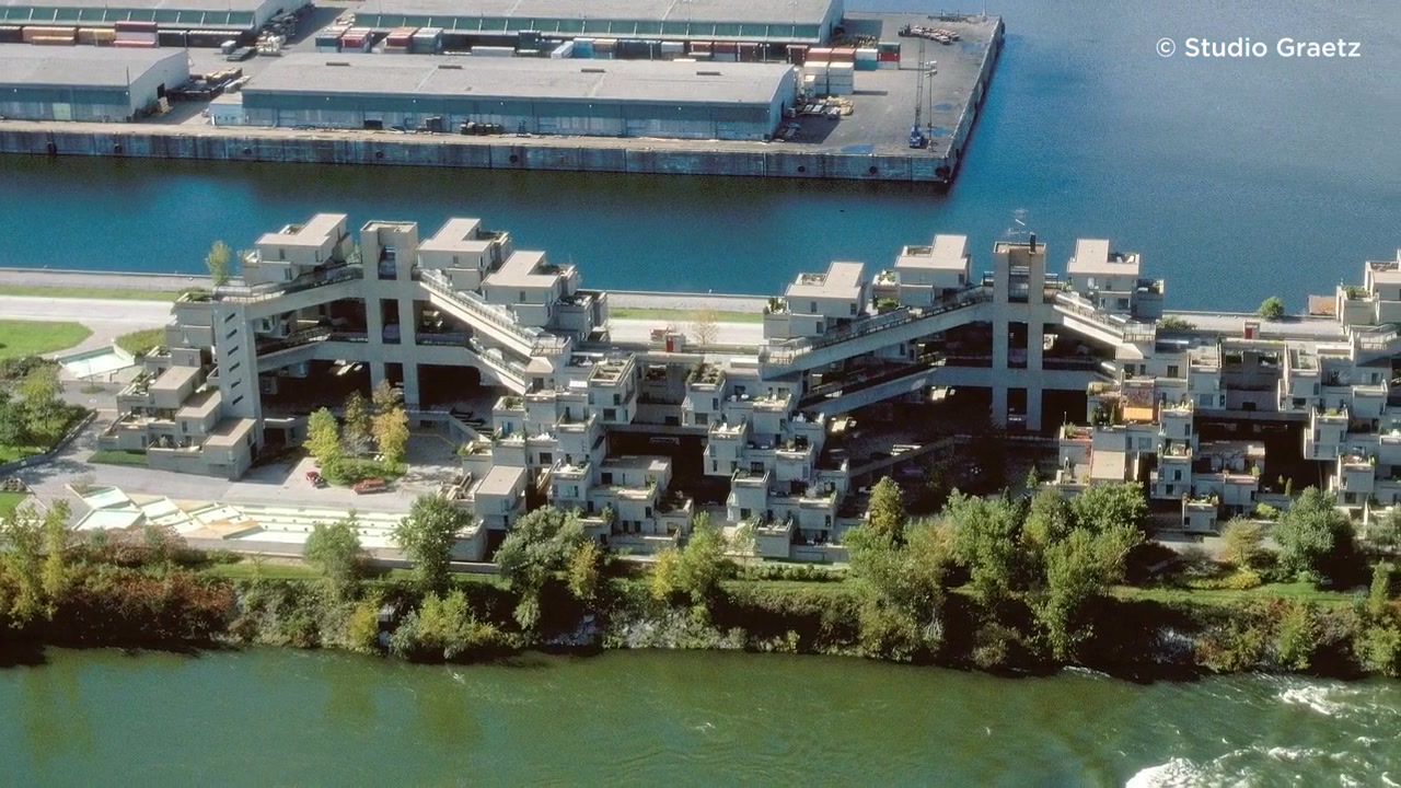Aerial view of the stacked concrete homes and terraces at Habitat 67 in Montréal