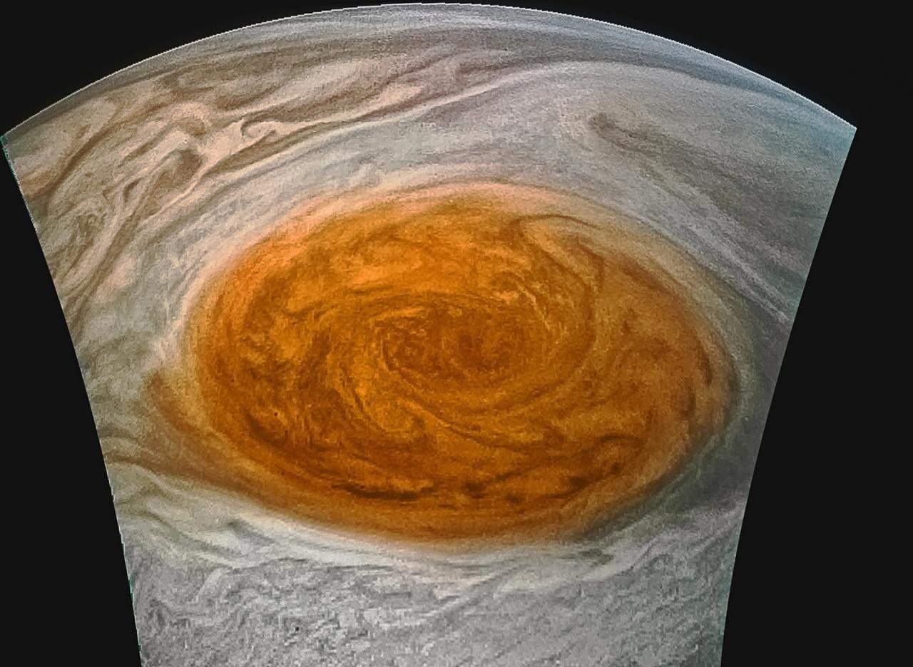 Close-up of Jupiter's Great Red Spot, a huge orange-red storm in the clouds