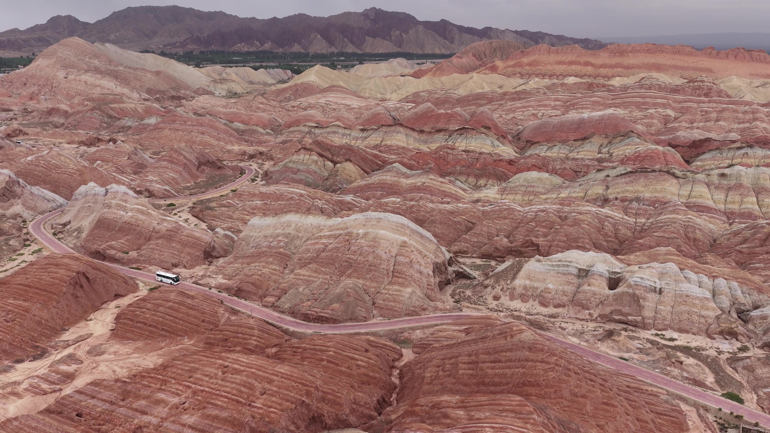 Bands of red and pale rock across the rainbow hills near Zhangye in Gansu, China